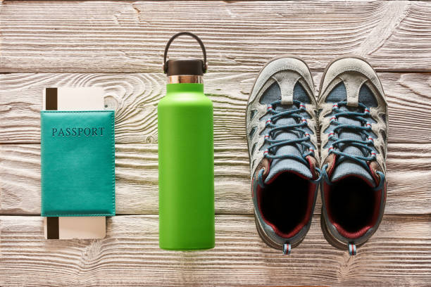 istock Travel items for hiking flat lay 956835608