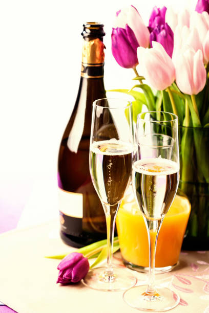 istock Two flute glasses filled with champagne 956838050