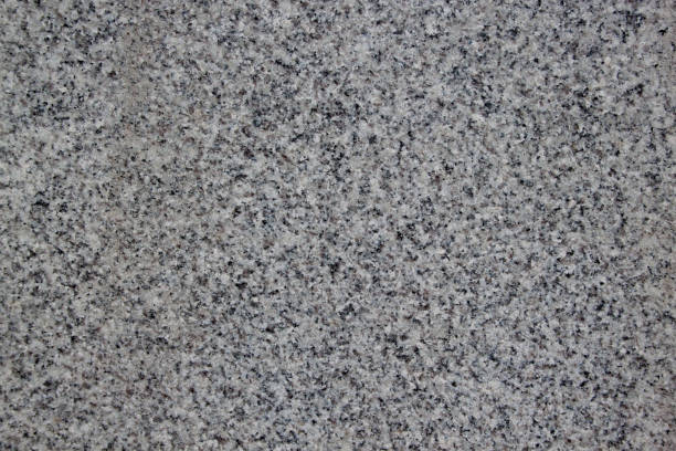 istock Abstract gray texture with holes. Sandstone. 956840634