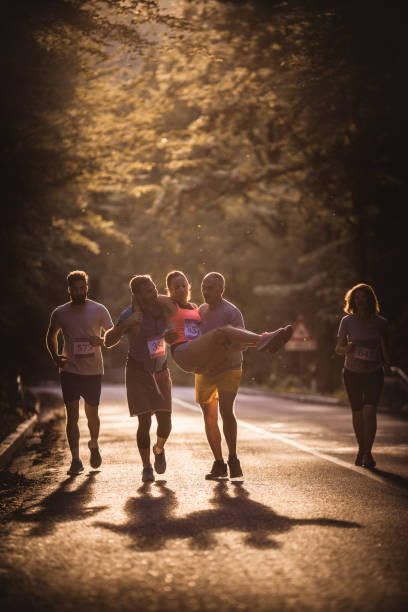 istock Helping injured athlete on marathon race! 956840644