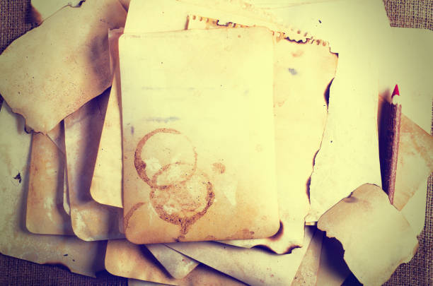 istock Vintage old papers, notes, pensil, on burlap, sackcloth background. Vintage and retro design effects 956840808