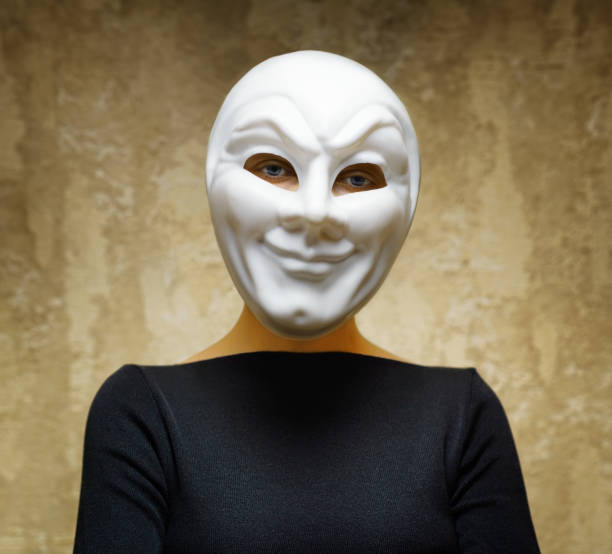 istock Woman in white mask. Horror concept 956840832