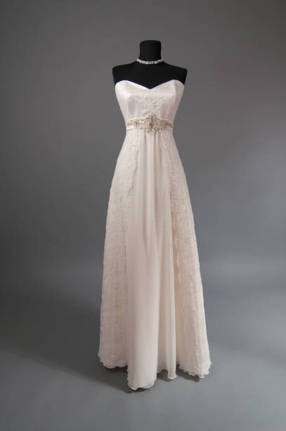 istock ivory Wedding dress on a mannequin 956841024