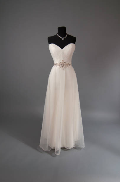 istock ivory Wedding dress on a mannequin 956841048