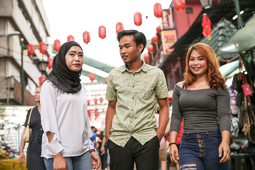 Three friends hangout and shopping at Kuala Lumpur
