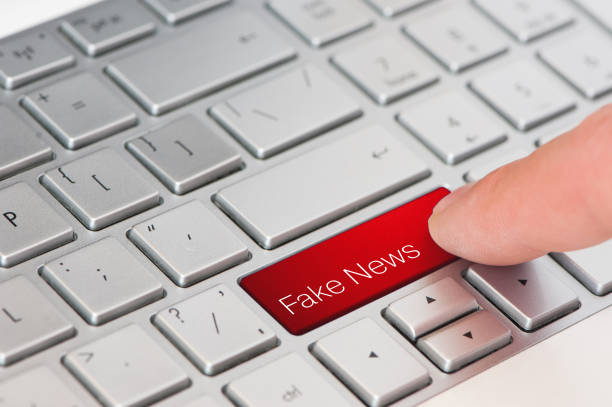 istock A finger press red fake news button on laptop keyboard 956845120