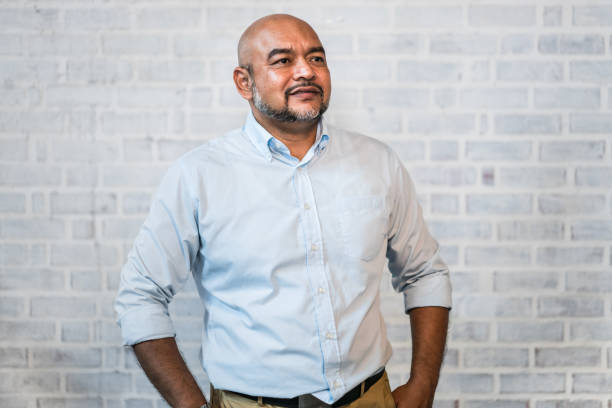 istock Real Malaysian man standing and looking away 956845640
