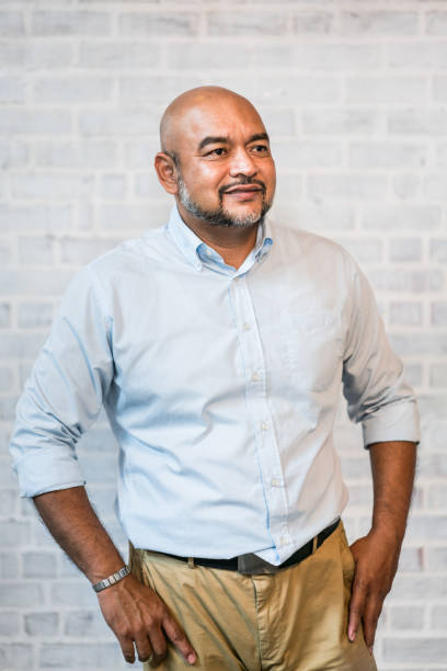 istock Real Malaysian man standing and looking away 956845678