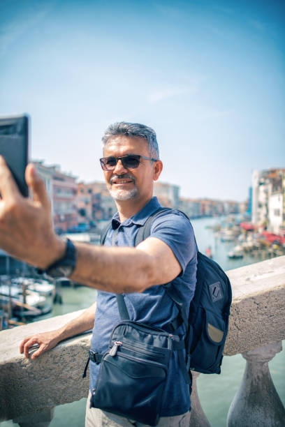 istock Selfie on Canal Grande with Rialto Bridge 956850936