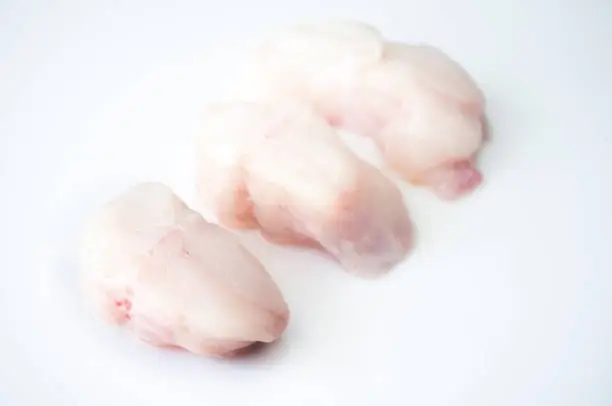 Monkfish tail steaks. Isolated over white background. Isolated over white background