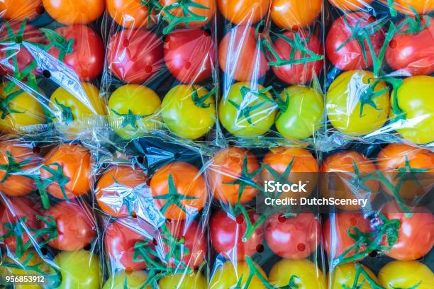 Display Of Fresh Plastic Wrapped Cherry Tomatoes Stock Photo - Download Image Now - Plastic, Packaging, Food