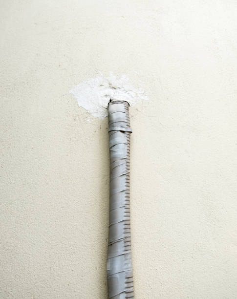 istock Trough tube from air conditioner 956855230