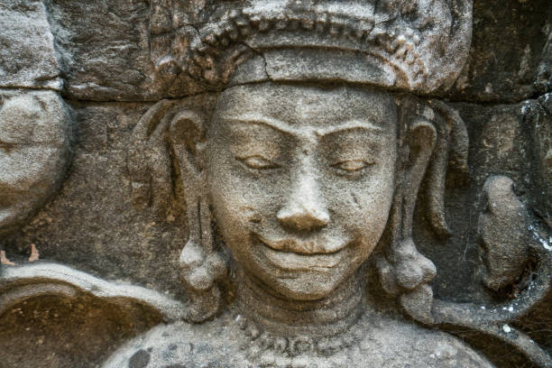 Stone carving in ancient temple in Angkor Was temples complex located in Siem Reap, Cambodia, South East Asia