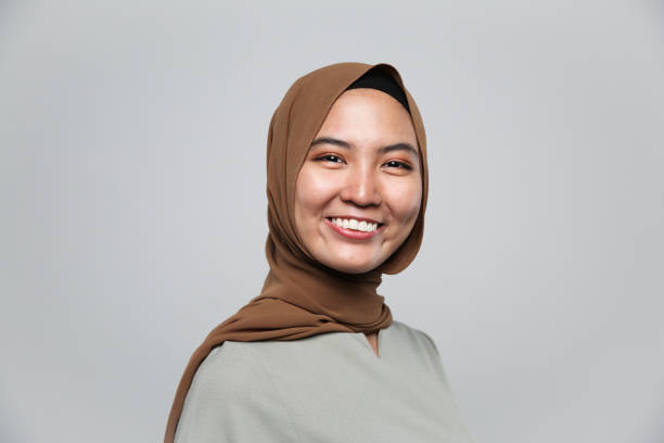 istock One women smile with white background 956864928