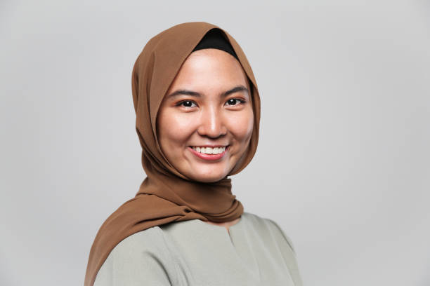 istock One women smile with white background 956864988