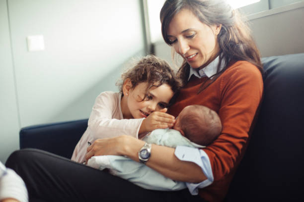 istock Family visiting after a childbirth 956873076