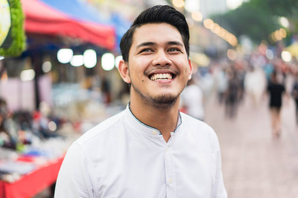 istock Confident young man enjoying outdoors. 956878978