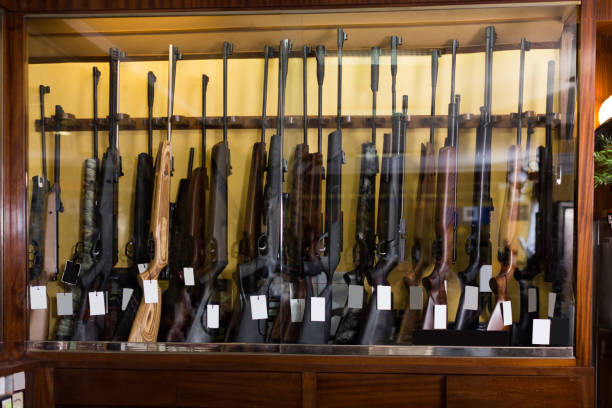 gun store interior with rifles - airsoft gun imagens e fotografias de stock