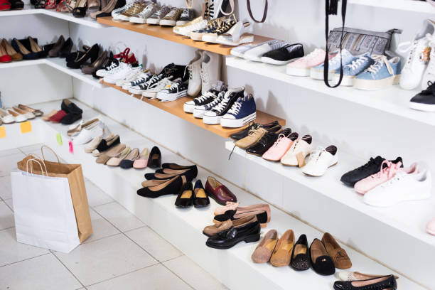 istock Shelves with sneakers in shop 956885924