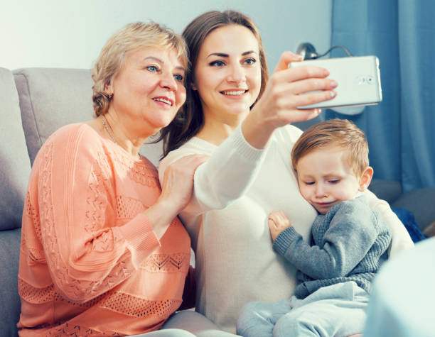 istock Family is taking selfie together 956887564