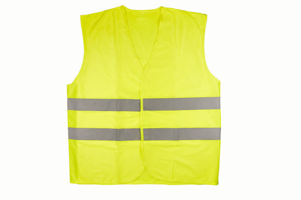 reflective vest Yellow vest isolated on black reflector stock pictures, royalty-free photos & images