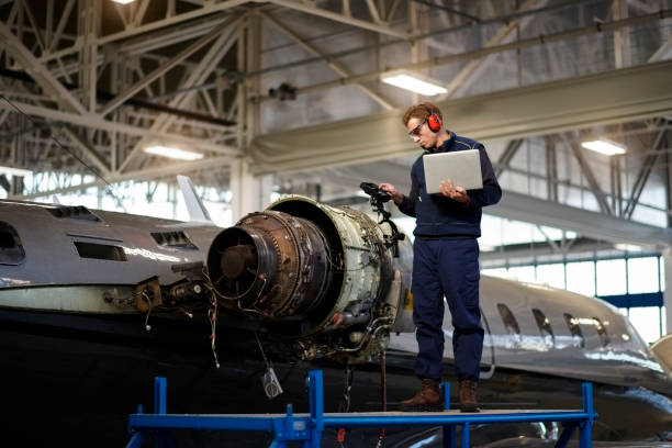 istock Aircraft mechanic in the hangar 956888248