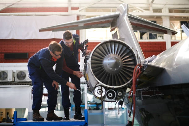 istock Aircraft mechanics in the hangar 956888324