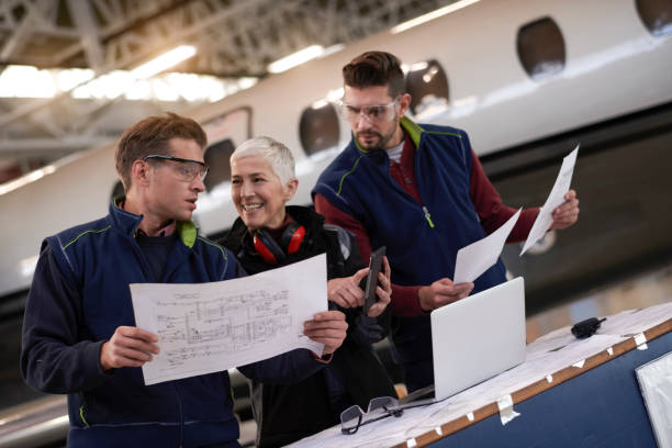 istock Aircraft mechanics in the hangar 956888524
