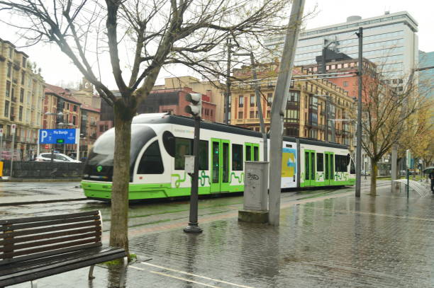 Picturesque Tramway Bilbao In Its Pass By The Guggenheim Museum. Transportation Travel Holidays. stock photo