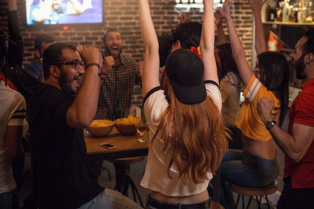 istock Soccer fans cheering 956898498