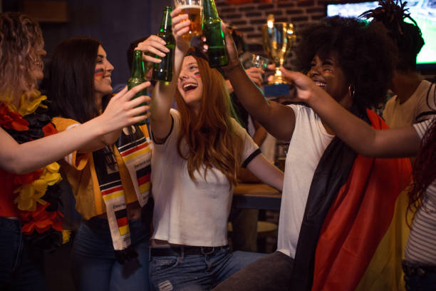 istock Soccer fans cheering 956905796