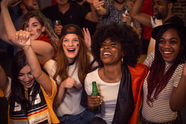 istock Soccer fans cheering 956906942