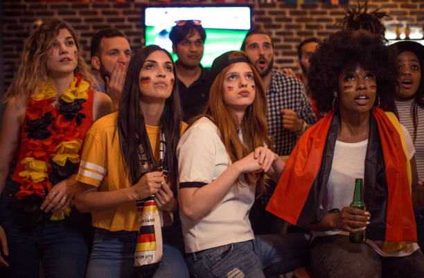 istock Soccer fans cheering 956907968