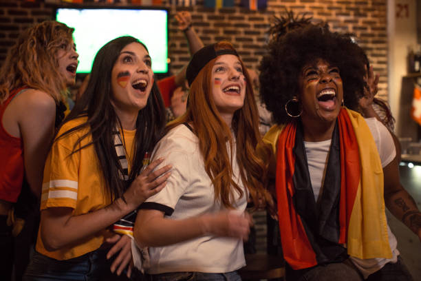 istock Soccer fans cheering 956910672
