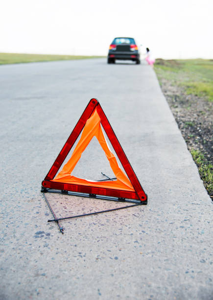 istock Red triangle sign on the road 956911594