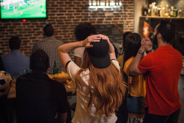 istock Soccer fans cheering 956911734