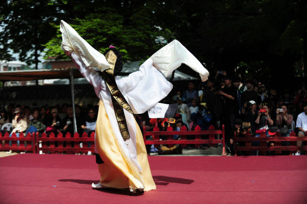 At the Annals of the Joseon Dynasty airing reproduce ceremony,Korean traditional dance at the Gyeonggijeon Hall in Jeonju, South Korea. stock photo