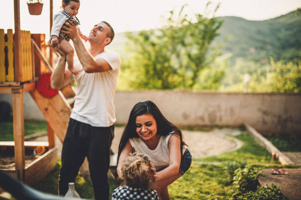 istock Happy family on the playground 956913472