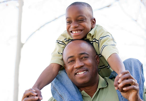 istock African American Man and Child Having Fun 95692704