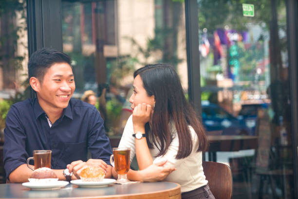 istock two couple dating in a cafe and enjoy their high tea session 956931748