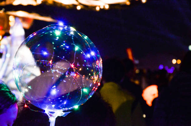 istock LED transparent balloon with multi-colored luminous garland 956939226