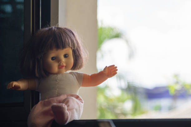 girl doll Sitting at the window