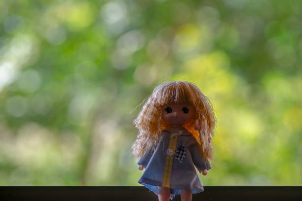 girl doll Standing at the window