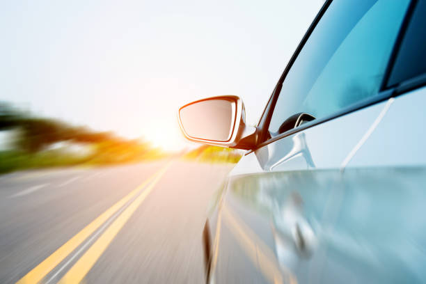 istock View from side of car on the road 956942372