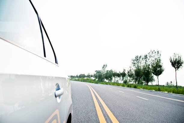 istock View from side of car on the road 956942536