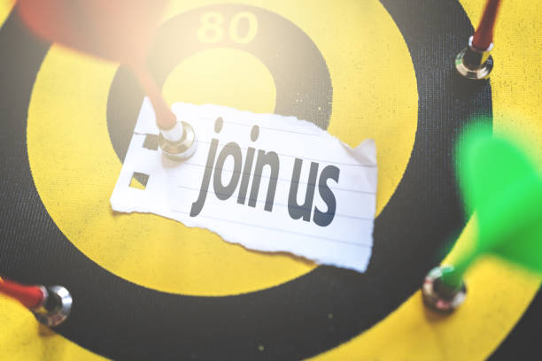 istock Join Us written on Arrow in the bullseye 956943236