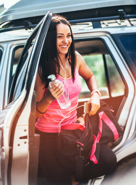 istock Sporty woman exercising 956943312