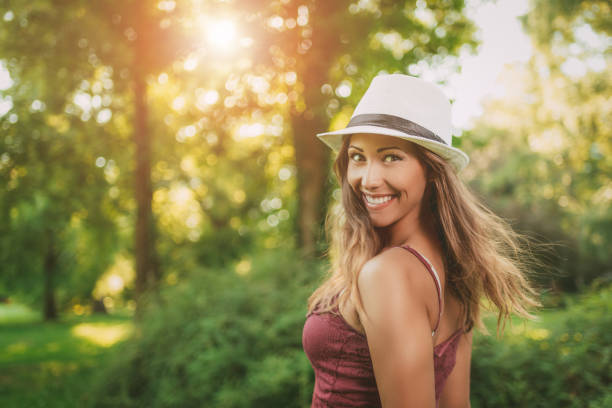 istock Young Woman With Hat 956943928