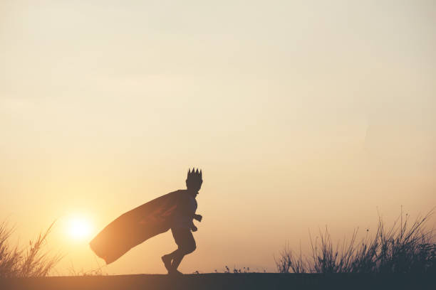 istock Super boy standing show power strong to fly 956945566