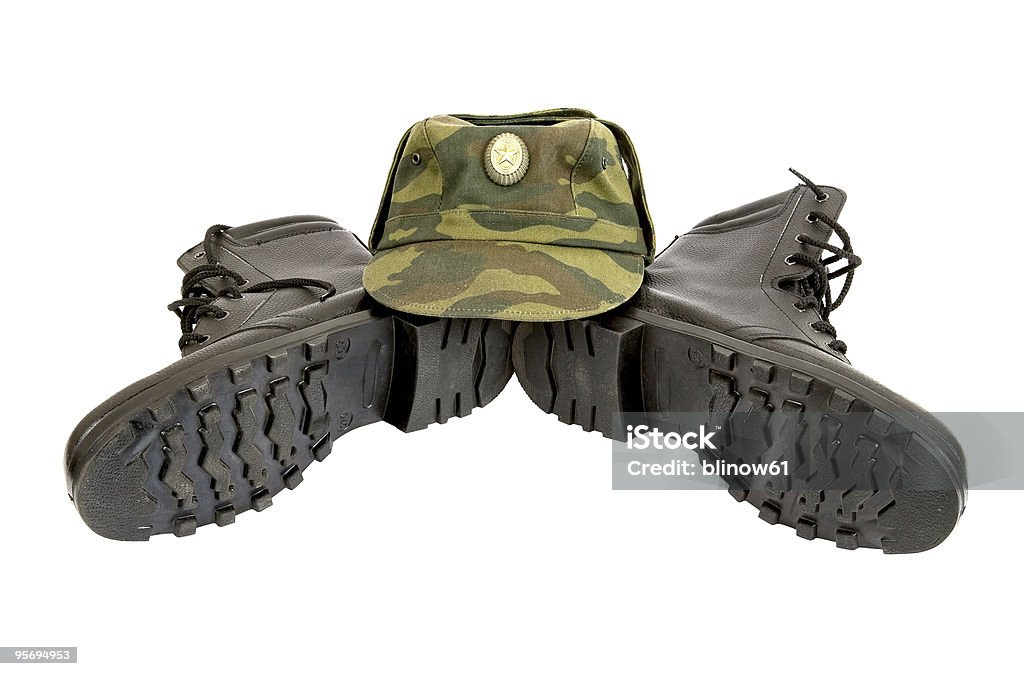 Армейские ботинки и крышкой - Стоковые фото Армия роялти-фри